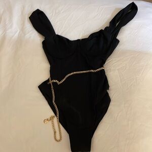 Weworewhat black one piece with gold chain size medium, never worn